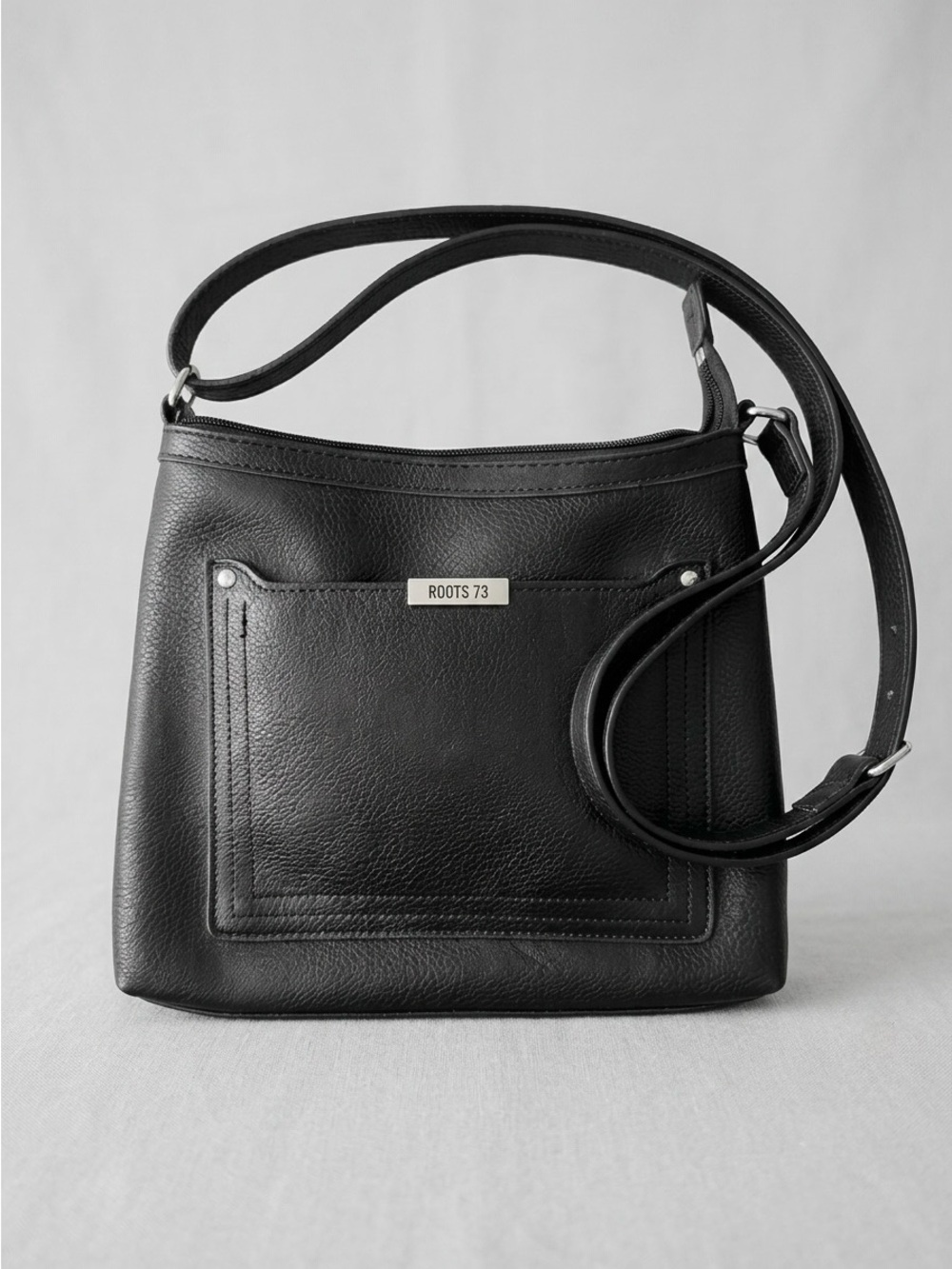 Roots Black Crossbody Vegan Pebbled Leather Bag with Front Pocket